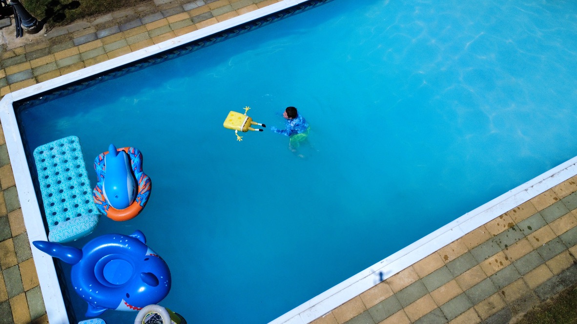 Top-down aerial view of a swimming pool